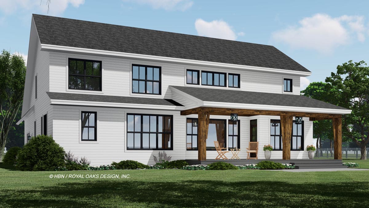 A modern white two-story house with a black shingle roof, large black-framed windows, and a covered porch with wooden beams.