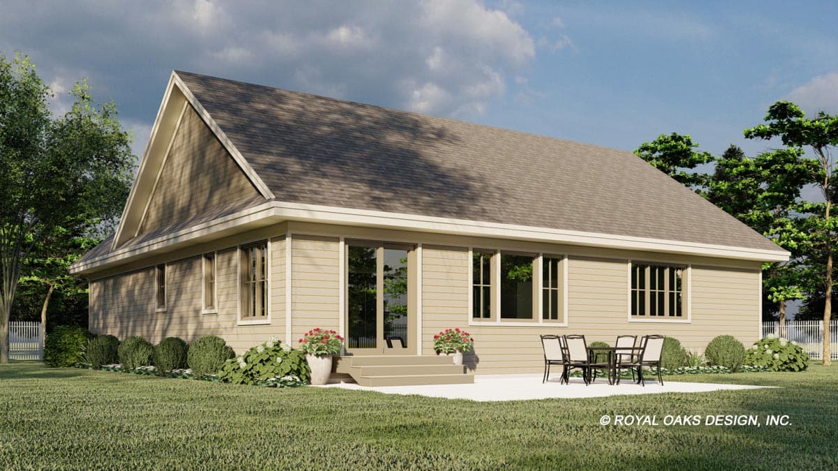 House plan exterior: Ranch style, single-story with prominent gables, wide eaves, and a centered patio with seating.