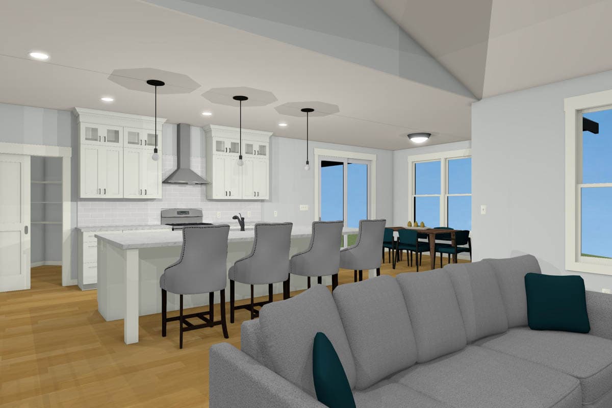 Open concept living area with kitchen island, dining area, and sectional sofa. White cabinetry, tiled backsplash.