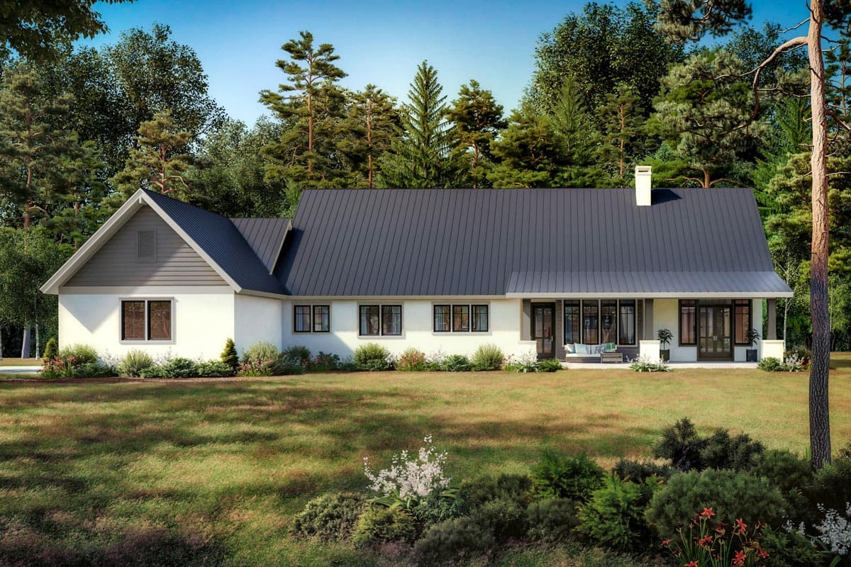 House plan exterior: One-story modern farmhouse with a prominent gable, large covered porch, and dark metal roof.