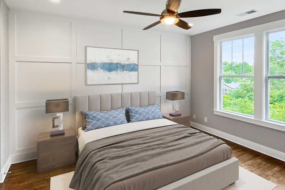 Interior rendering of a bedroom with a bed, nightstands, ceiling fan, and large windows overlooking trees.
