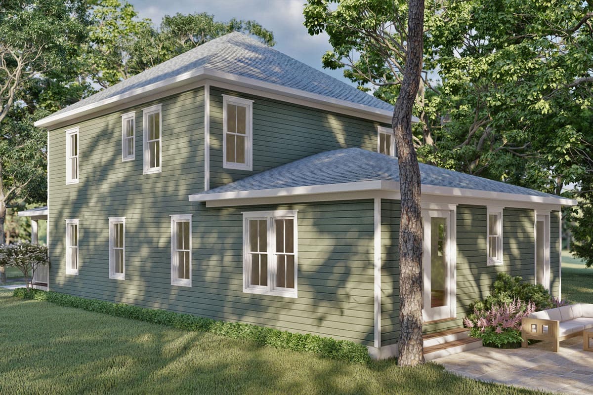 Two-story house plan exterior with green siding, white-trimmed windows, and a gabled roof.