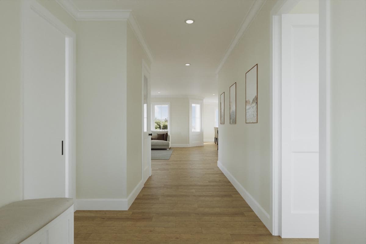 Interior rendering of a hallway with wood floors, recessed lighting, crown molding, and artwork.