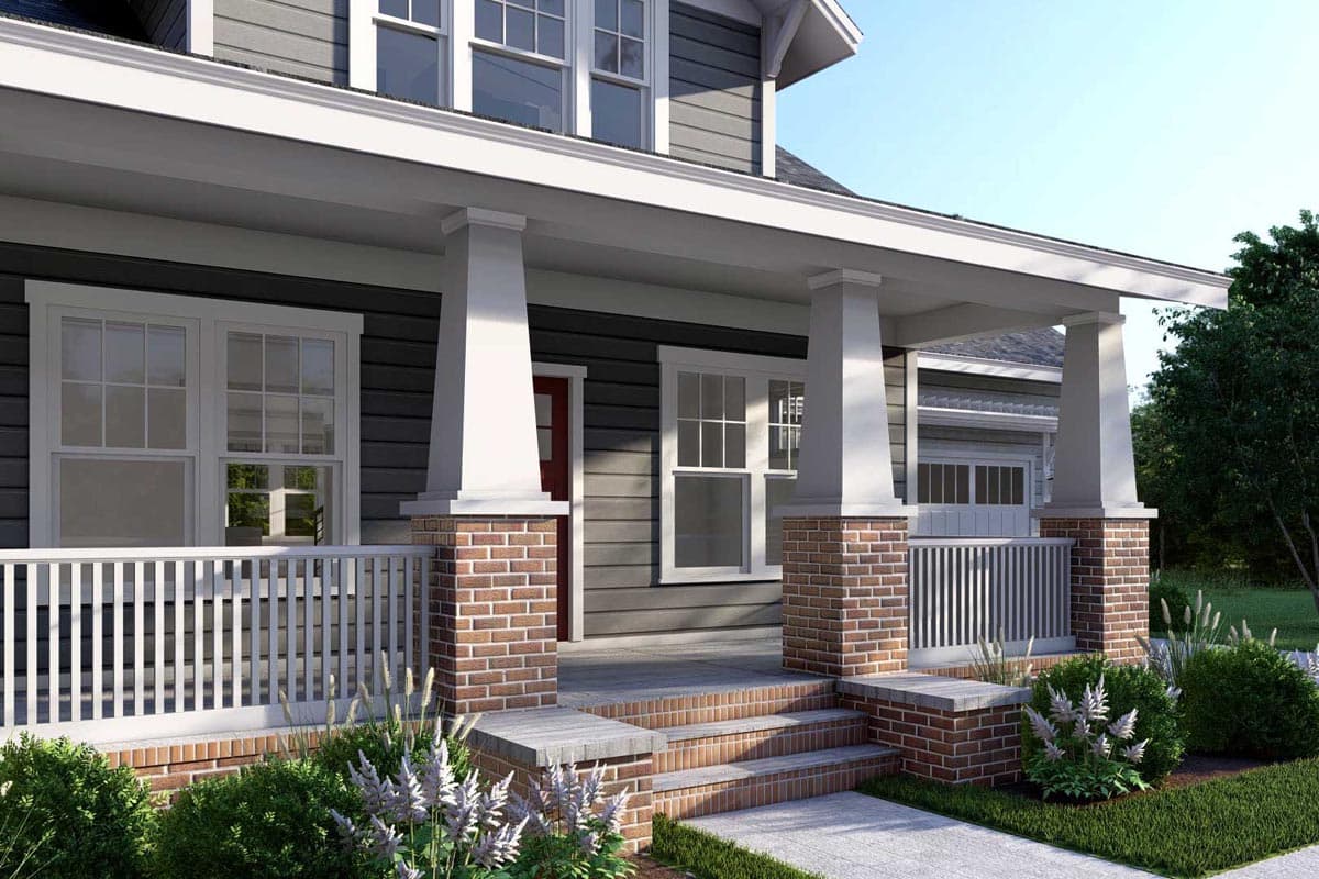 House plan exterior: Craftsman style, two stories, features a prominent covered porch with brick pillars, multi-pane windows, and gabled dormers.