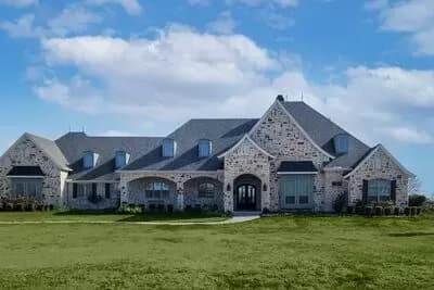 Sprawling Country House Plan with Split-bed Layout