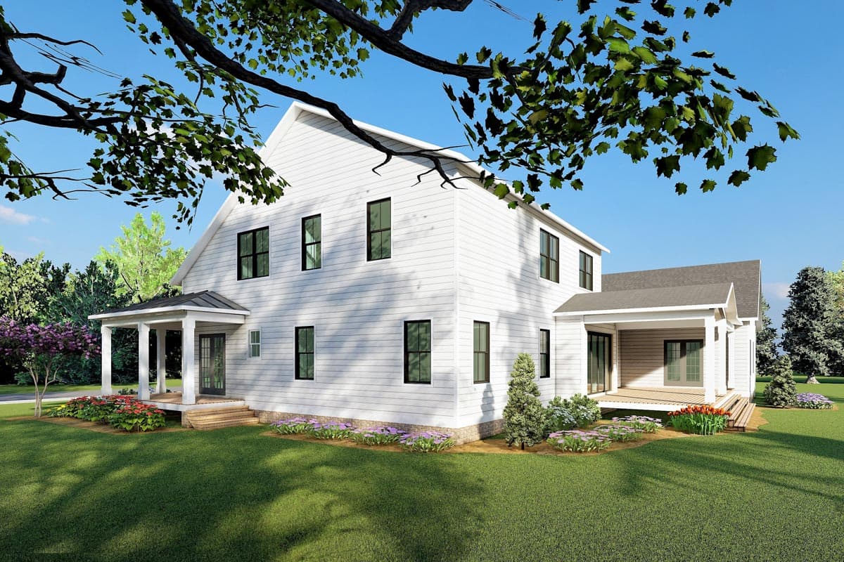 House plan exterior. Modern Farmhouse style, two stories, white lap siding, gabled roofs, covered front porch with columns, and rear deck.