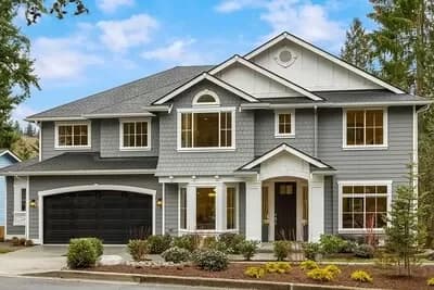5-Bed House Plan with Large Covered Deck Behind the 2-Car Garage