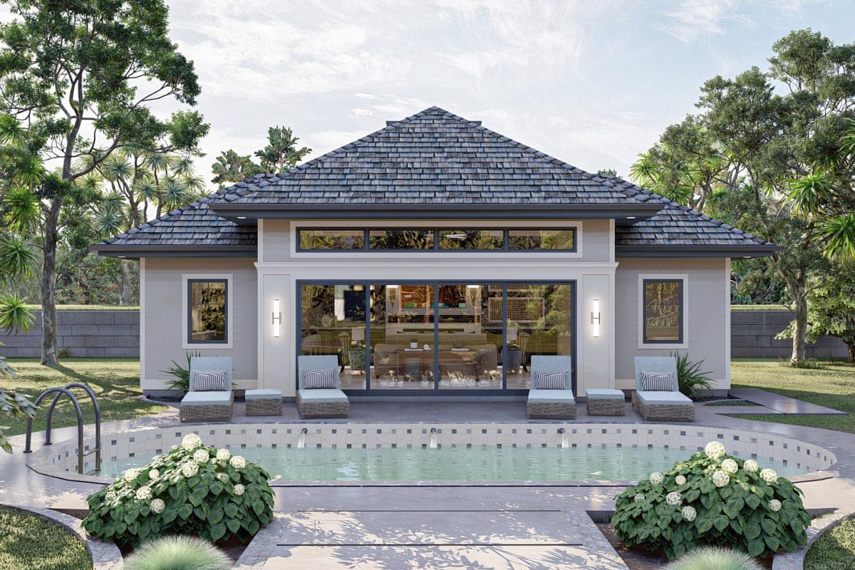 House plan exterior. Single-story with a gabled roof. Features include large sliding glass doors, a covered porch area, and a rectangular roofline.