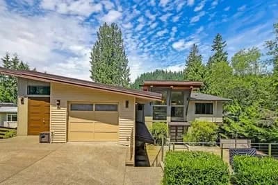 Modern Northwest Home Plan with Stacked 4-Car Garage and Shop