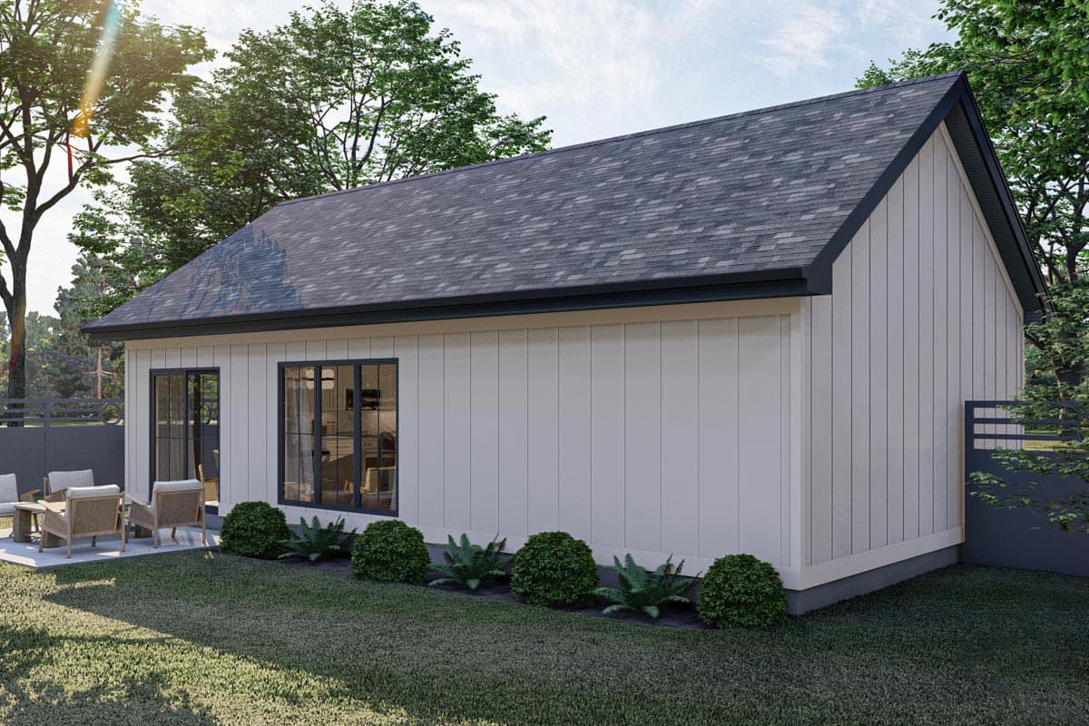 Modern farmhouse style house plan exterior, one story, white vertical siding, dark gable roof, multiple windows, patio.