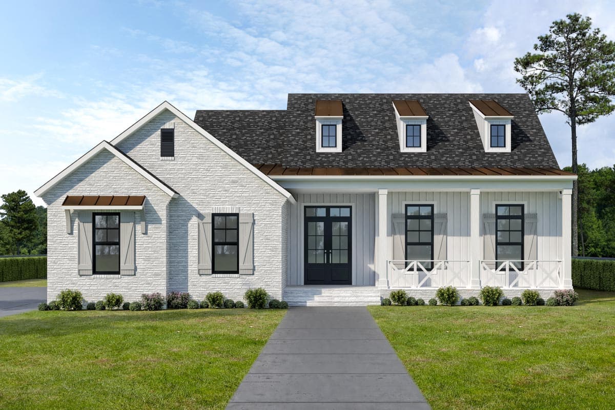 House plan exterior. One-story farmhouse with porch, brick facade, gabled roof, and three dormers. Features include shutters and a walkway.