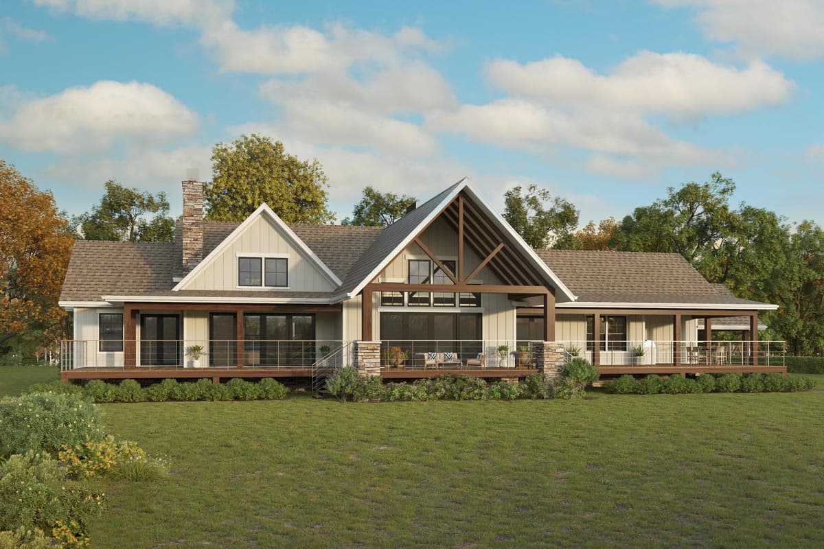 Modern Farmhouse house plan exterior with gables, stone chimney, and wraparound deck.