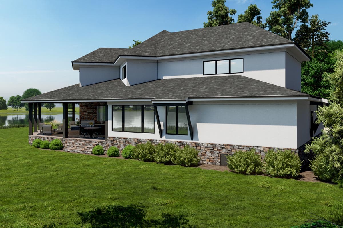 House plan exterior: Two-story modern home with a covered patio, stone accent base, and multi-pane windows.