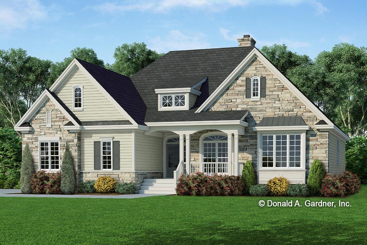 House plan exterior with stone accents, gabled roof, and a covered porch. Features include a dormer window and bay window.