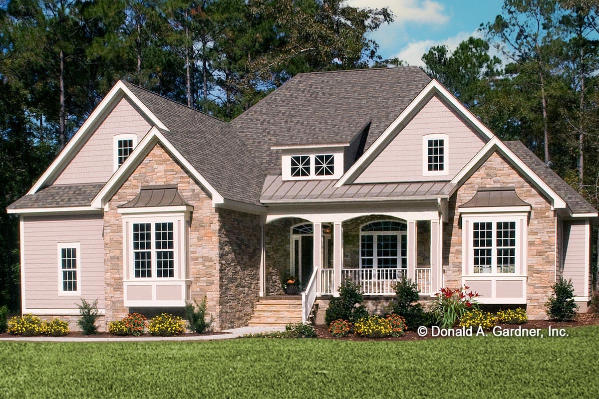 House plan exterior with stone veneer and shingle siding. Features include a front porch, multiple gables, and bay windows. Two-story house.