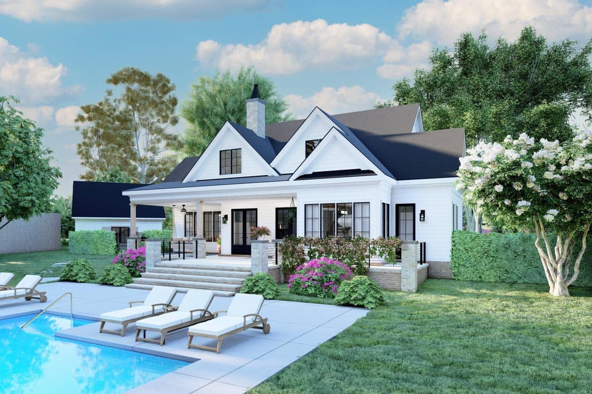 Modern Farmhouse house plan exterior with gables, a covered porch, and a detached garage.