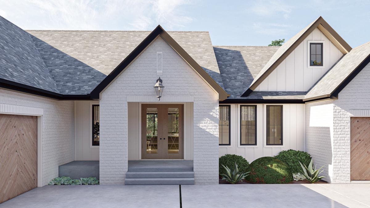 Modern Farmhouse house plan exterior with white brick, gables, dormers, a covered entry, and wood garage doors.