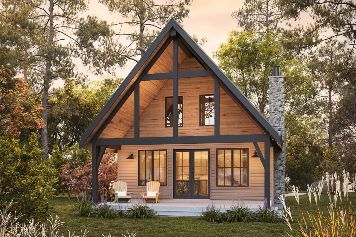 House plan exterior: Modern A-frame cabin with stone chimney, wood siding, covered porch, and exposed beam gable.