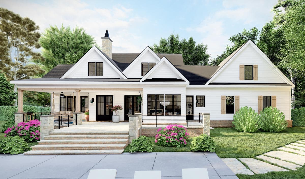 House plan exterior: Modern Farmhouse style, two stories, white siding, prominent gables, covered porch with stone accents, and a stone chimney.