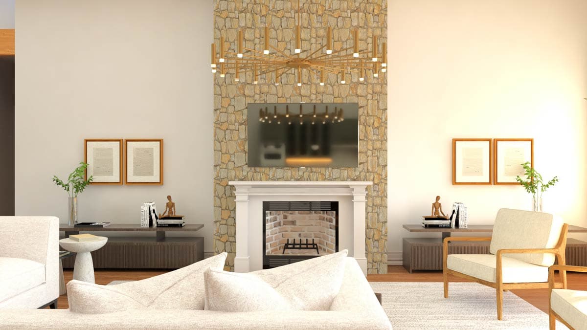 Living room with stone fireplace, mounted TV, white mantle, fireplace grate, and modern chandelier.