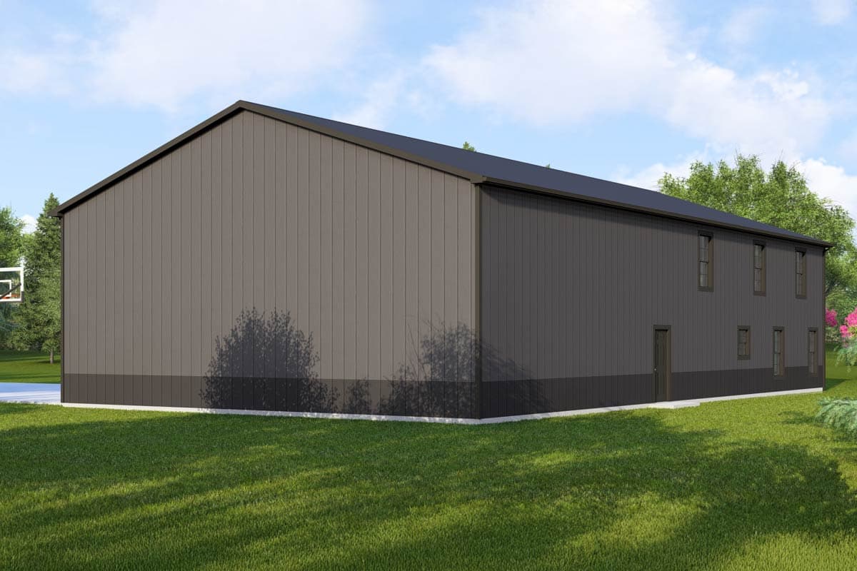 House plan exterior, two-story metal building with gable roof, featuring vertical panel siding and several windows.