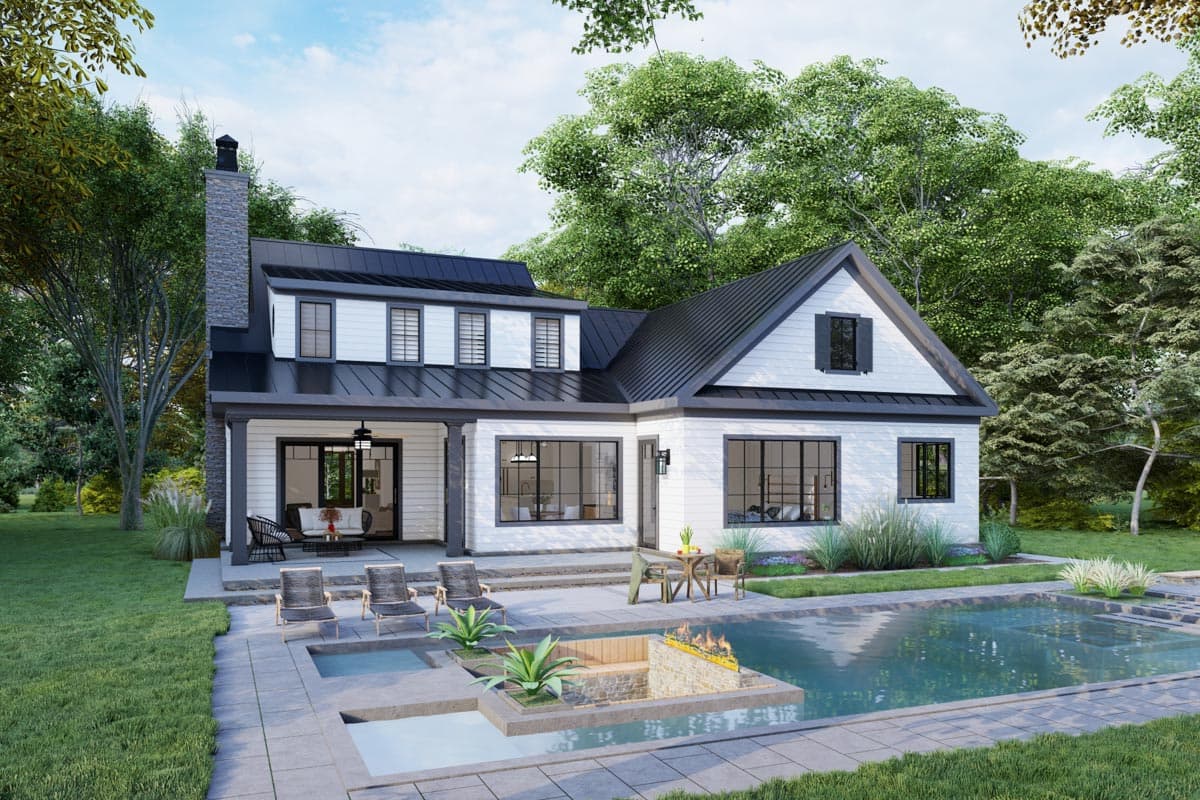 Modern Farmhouse house plan exterior with gabled roof, dormers, covered porch, and stone chimney.