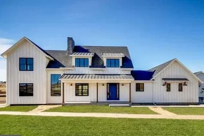 5-Bed Modern Farmhouse Plan with Vaulted Living Spaces