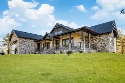 Luxury Mountain Craftsman Plan with Home Office and Walkout Basement