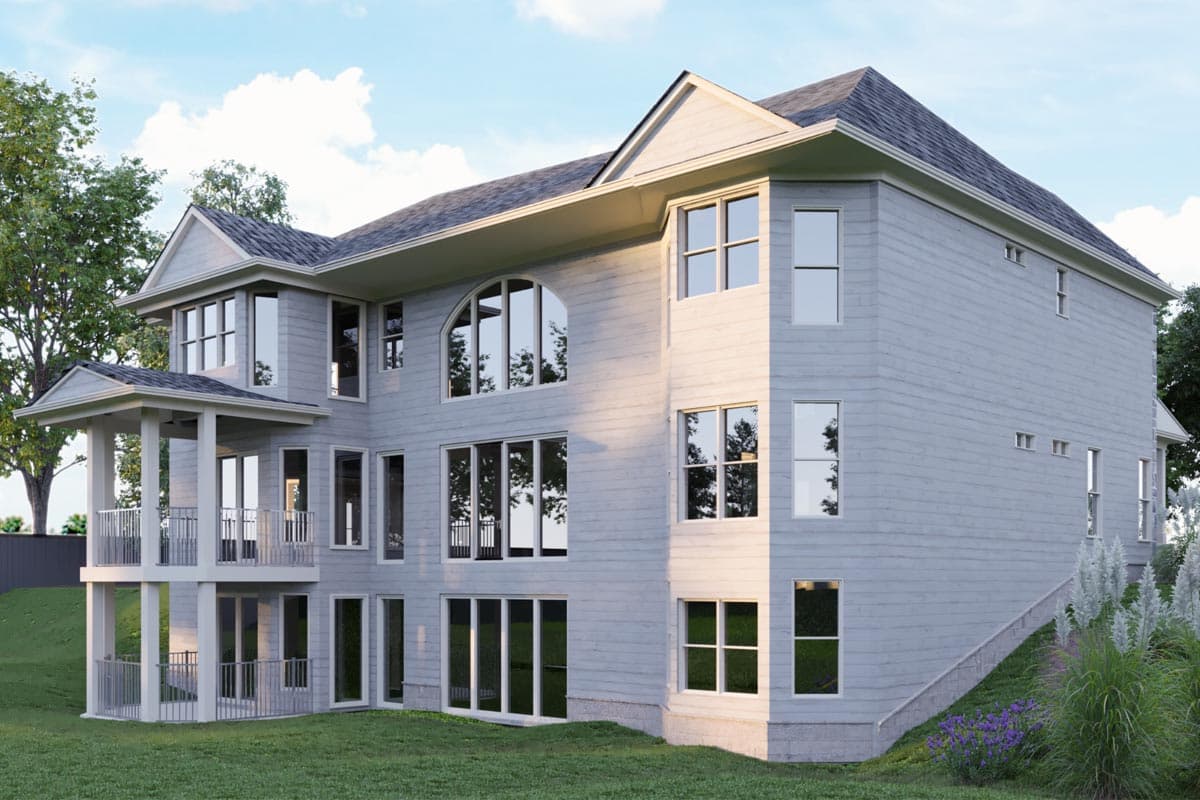 House plan exterior rendering shows a two-story home with gables, a covered porch, and multiple large windows, including an arched window.