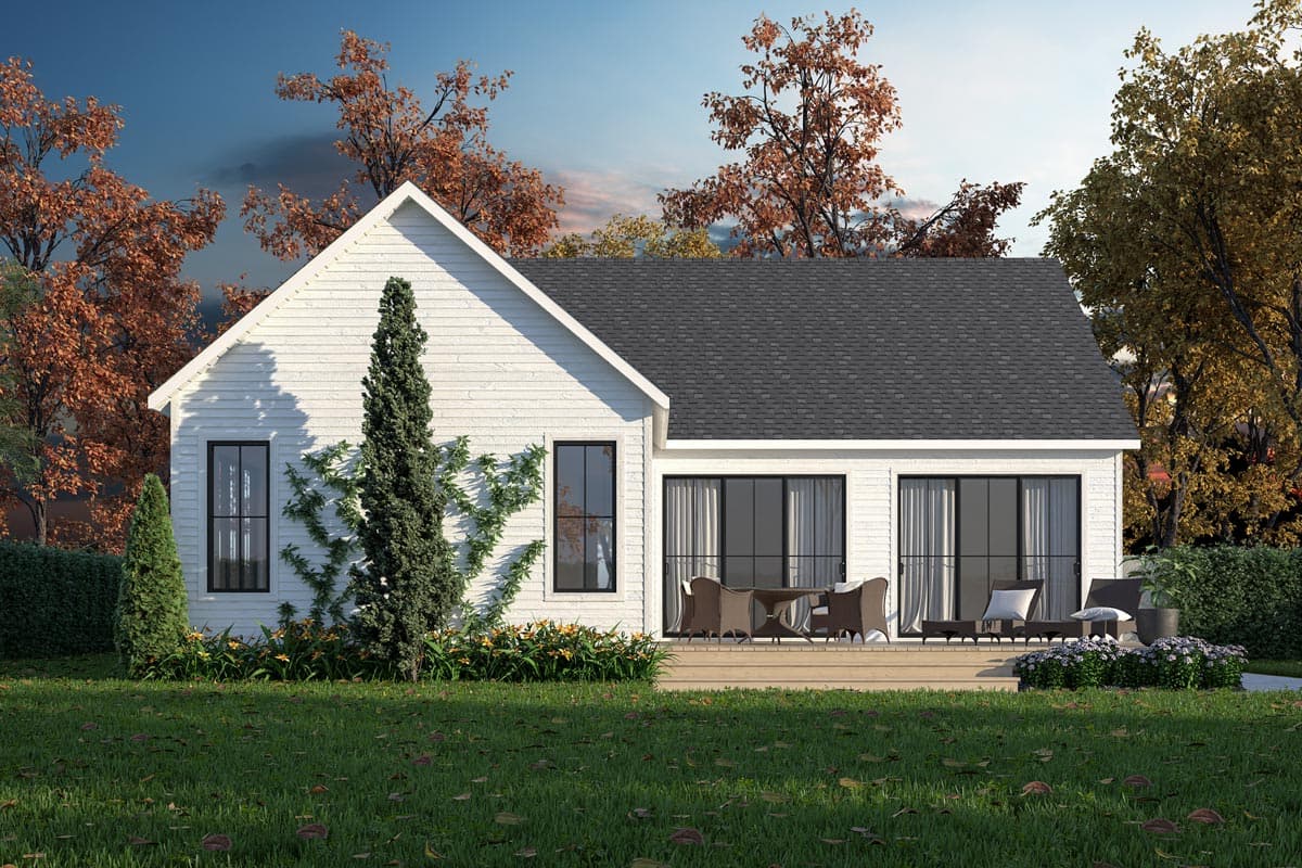 Modern Farmhouse house plan exterior with white siding, gable roof, and large deck with patio furniture.