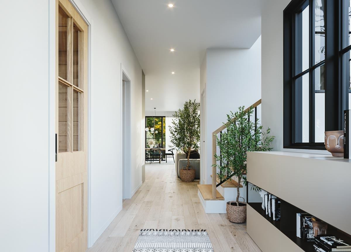 Interior hallway with light wood floor, doors, staircase, and dining area visible in background.
