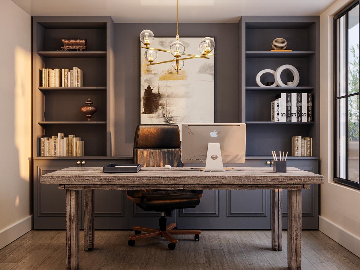 Office interior with built-in shelving, a wooden desk, computer, and leather chair.