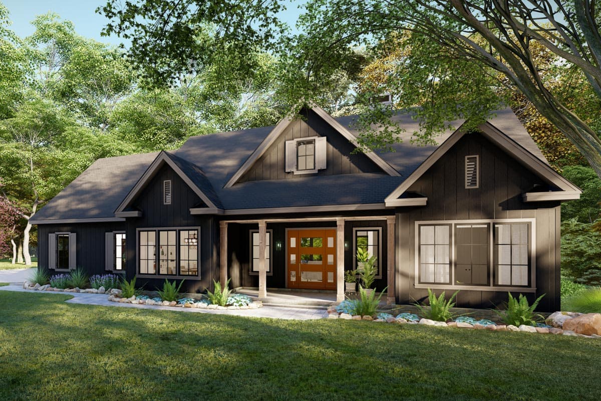 House plan exterior. Modern Farmhouse style with a single story, a covered porch, multiple gables, and a dark shingled roof.