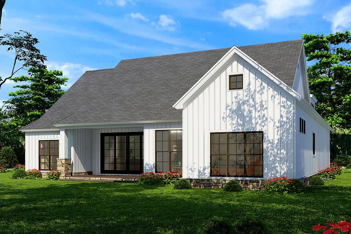 Modern Farmhouse house plan exterior with board and batten siding, large grid windows, and a gable roof.