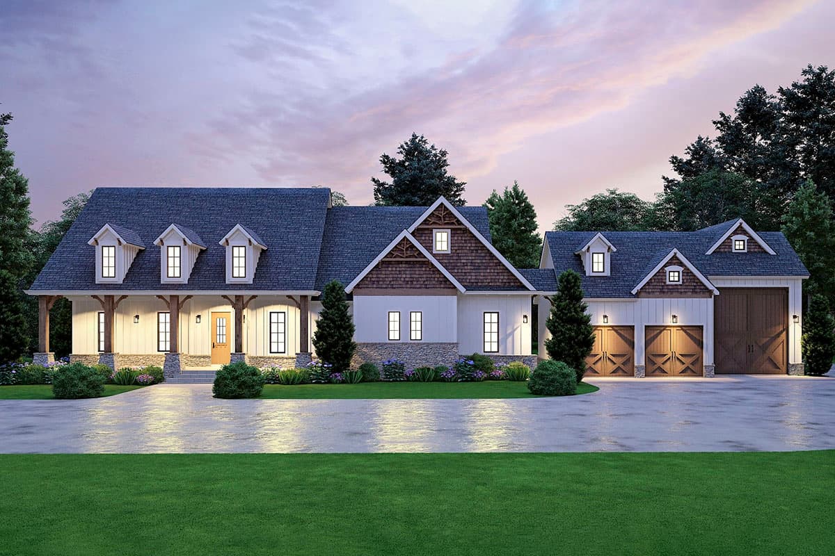 Modern Farmhouse house plan exterior with a wraparound porch, multiple dormers, and a three-car garage.