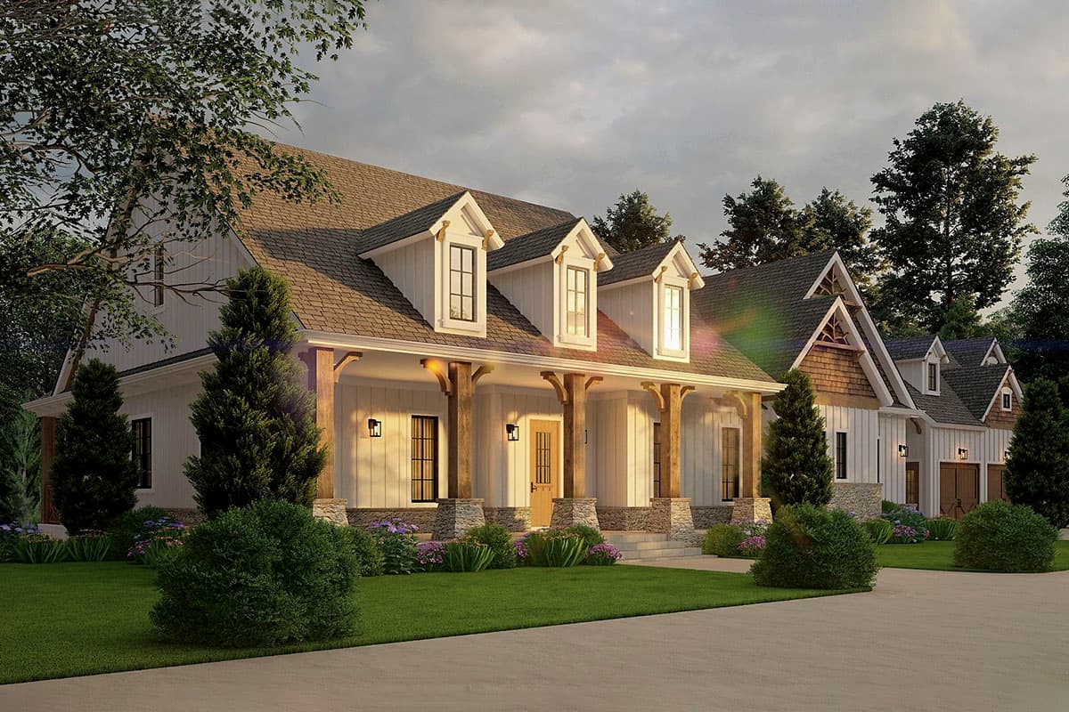 Modern Farmhouse house plan exterior with wide covered porch, stone bases, triple dormers, and attached garage.