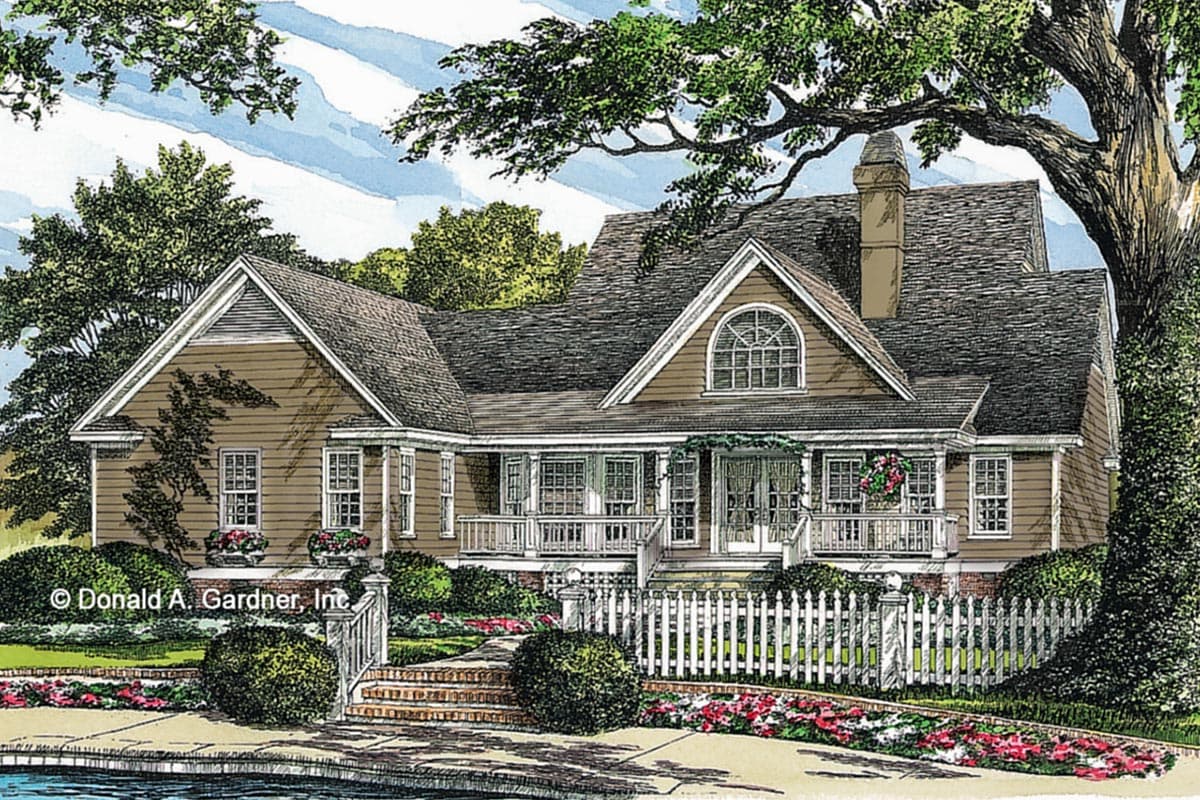 House plan exterior: Ranch style, one-story, featuring a wraparound porch, arched dormer window, and gabled rooflines.
