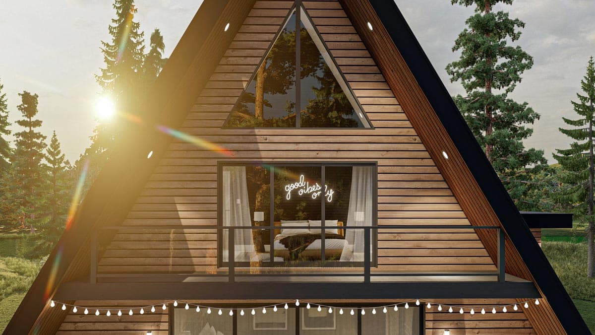 A-frame house plan exterior with a large triangular window, balcony, and wood siding.