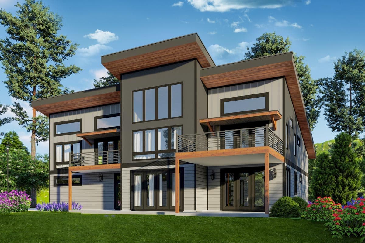 Modern house plan exterior, two stories, with cantilevered rooflines, balconies, and extensive glazing.