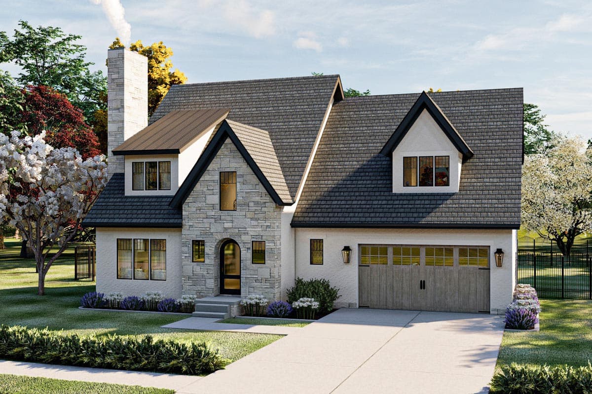 House plan exterior. Two-story home with stone facade, multiple gables, dormers, and an attached garage. Features a chimney and arched doorway.