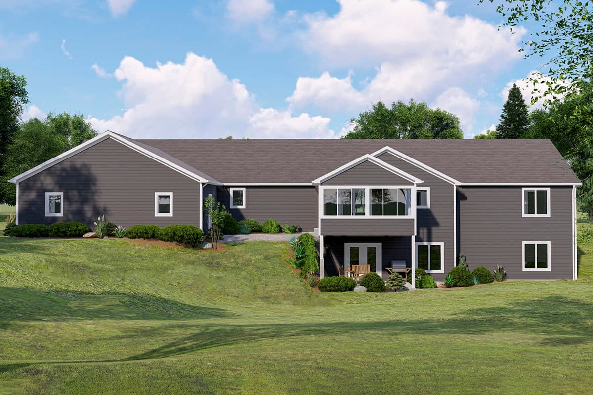 House plan exterior, one-story ranch with large sunroom, covered patio, and multiple gables.