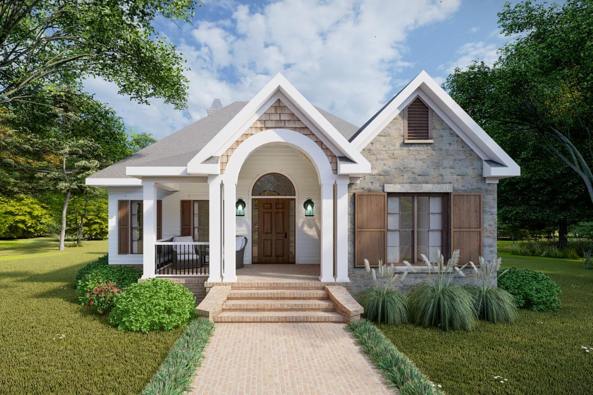 House plan exterior. One-story Cottage style home with gables, stone facade, and arched porch entry. Features include shutters and a brick walkway.