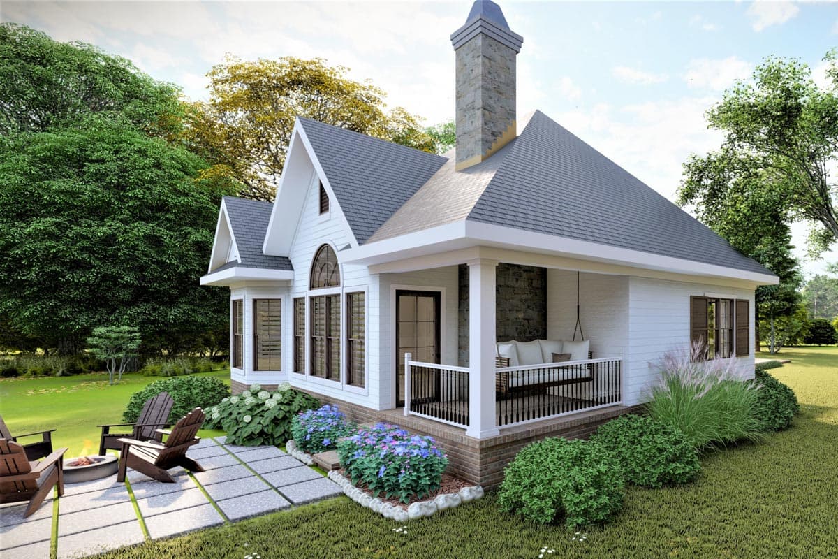 House plan exterior: One-story cottage with gabled dormers, stone chimney, and covered porch with swing.
