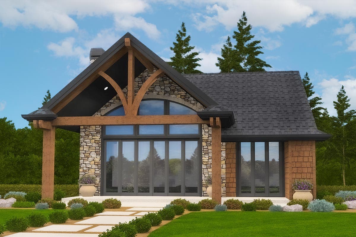 House plan exterior. Stone and wood siding with a gable roof. Features include a large covered porch, an arched window, and exposed wood beams.