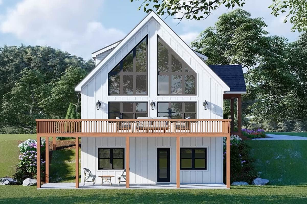 House plan exterior: Modern farmhouse style, two stories, with a prominent gable, large triangular upper windows, and a wraparound deck.