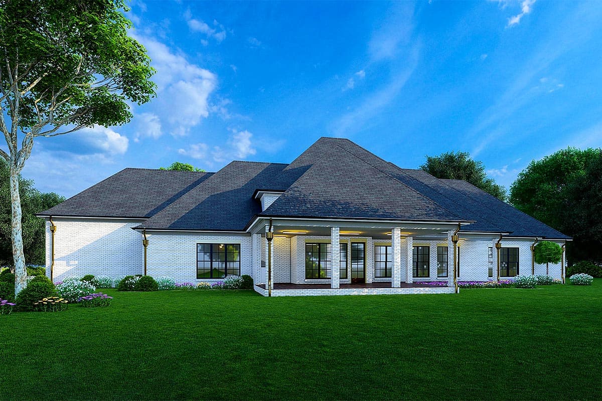 House plan exterior: Ranch-style home with white brick, gabled roof, covered patio, and large windows.