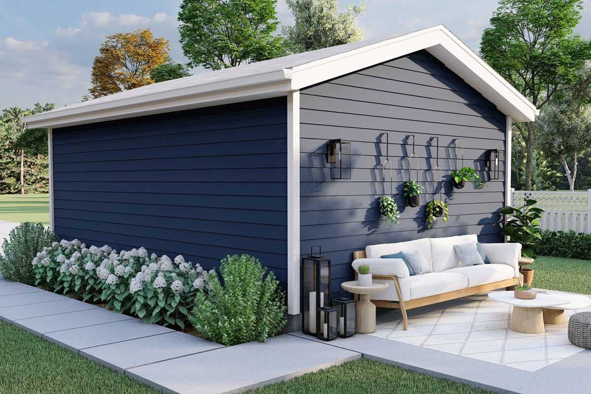 Modern house plan exterior with dark blue siding, gabled roof, white trim, and an outdoor seating area.