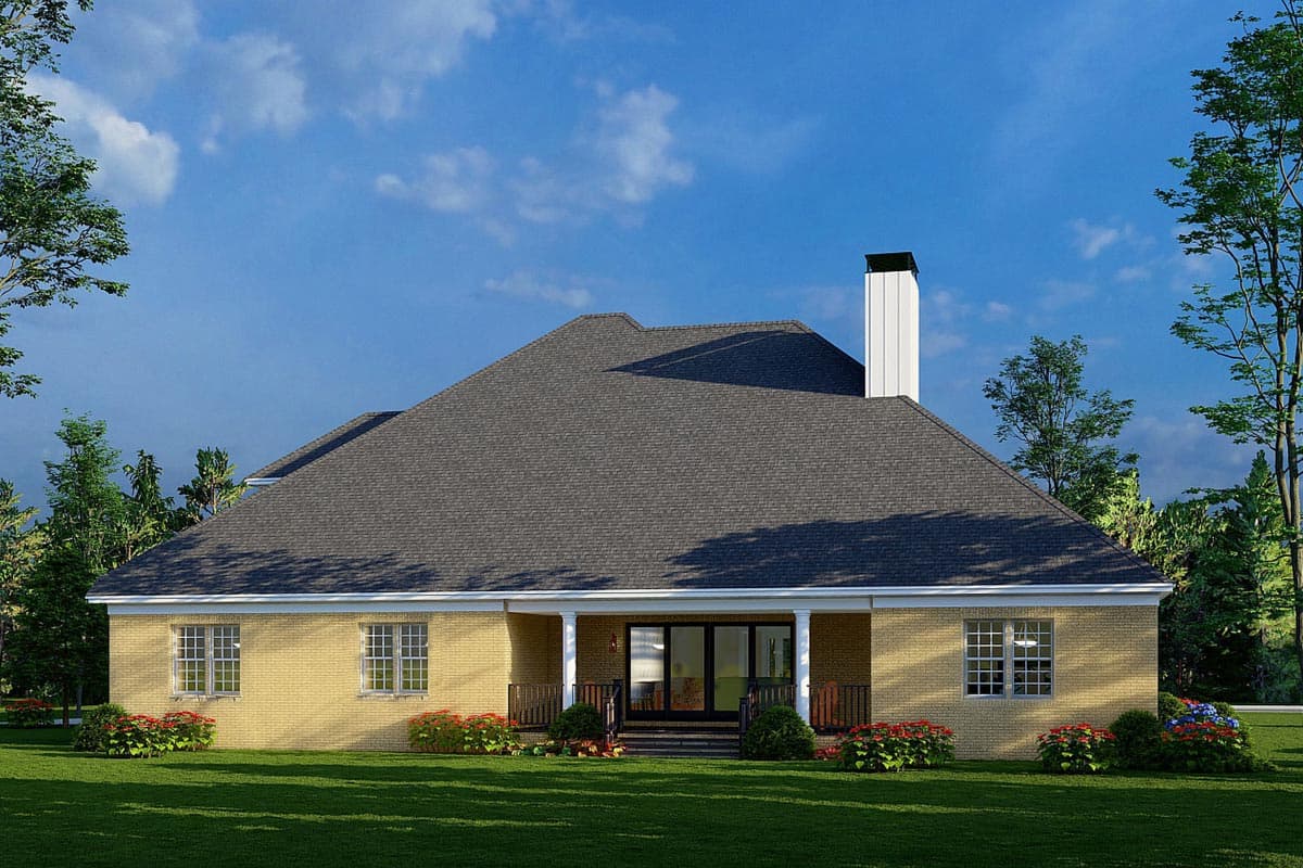 House plan exterior view: Single-story home with a hipped roof, covered porch with columns, and a tall chimney.