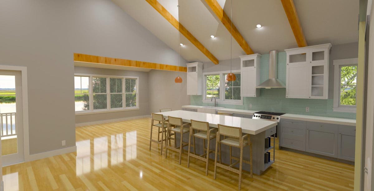 Modern kitchen with vaulted ceiling, exposed beams, large island with seating, and white cabinetry.