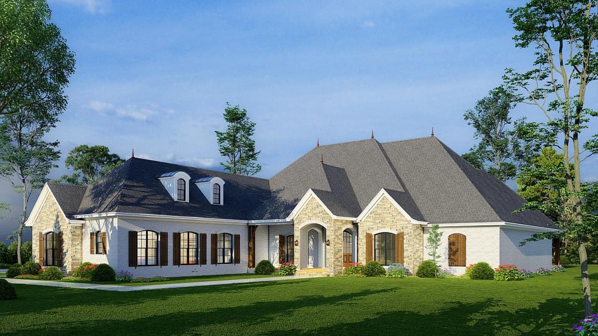 House plan exterior: One-story home with stone accents, multiple gables, arched dormers, and a covered entry porch.